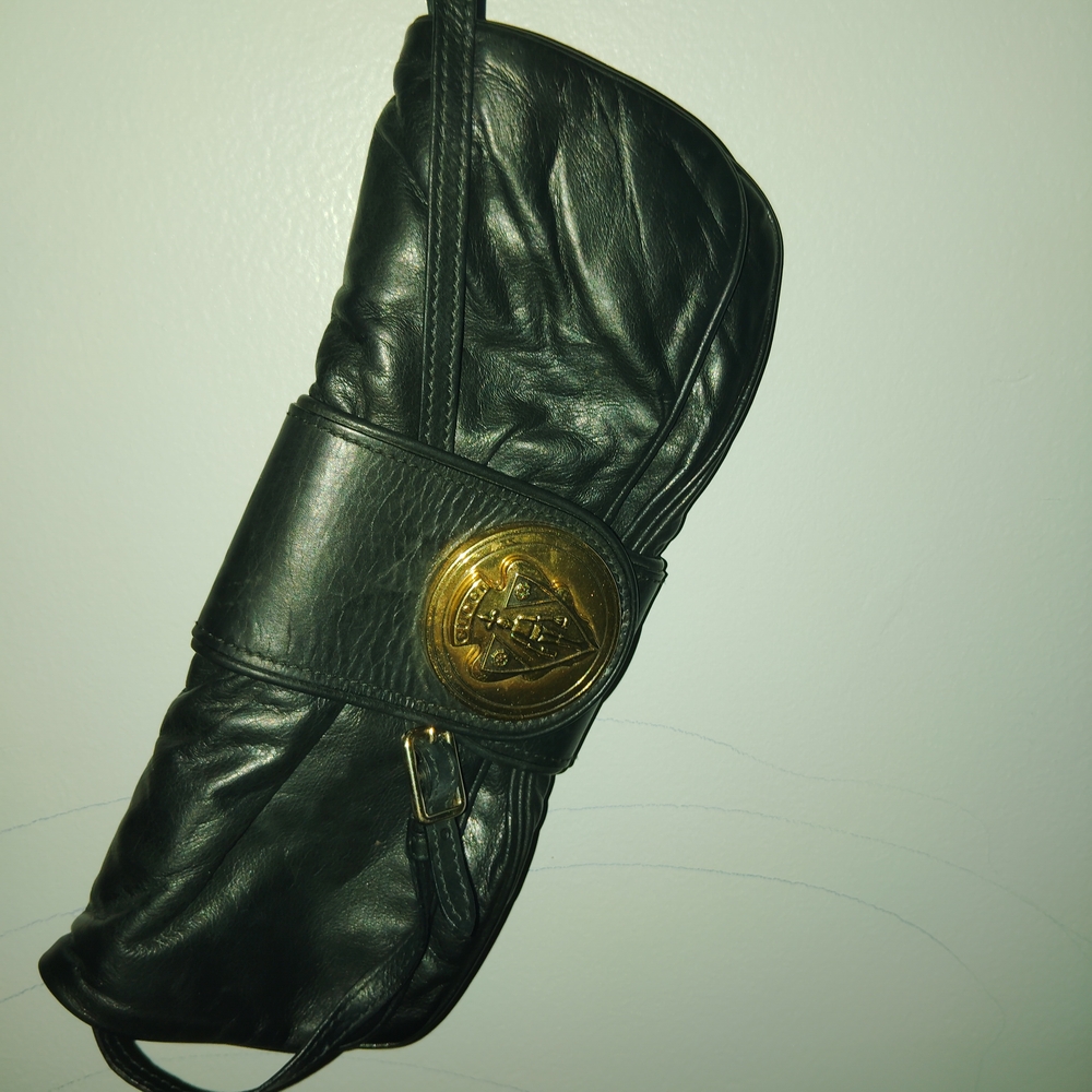 Gucci Black Leather Clutch with Gold Emblem
